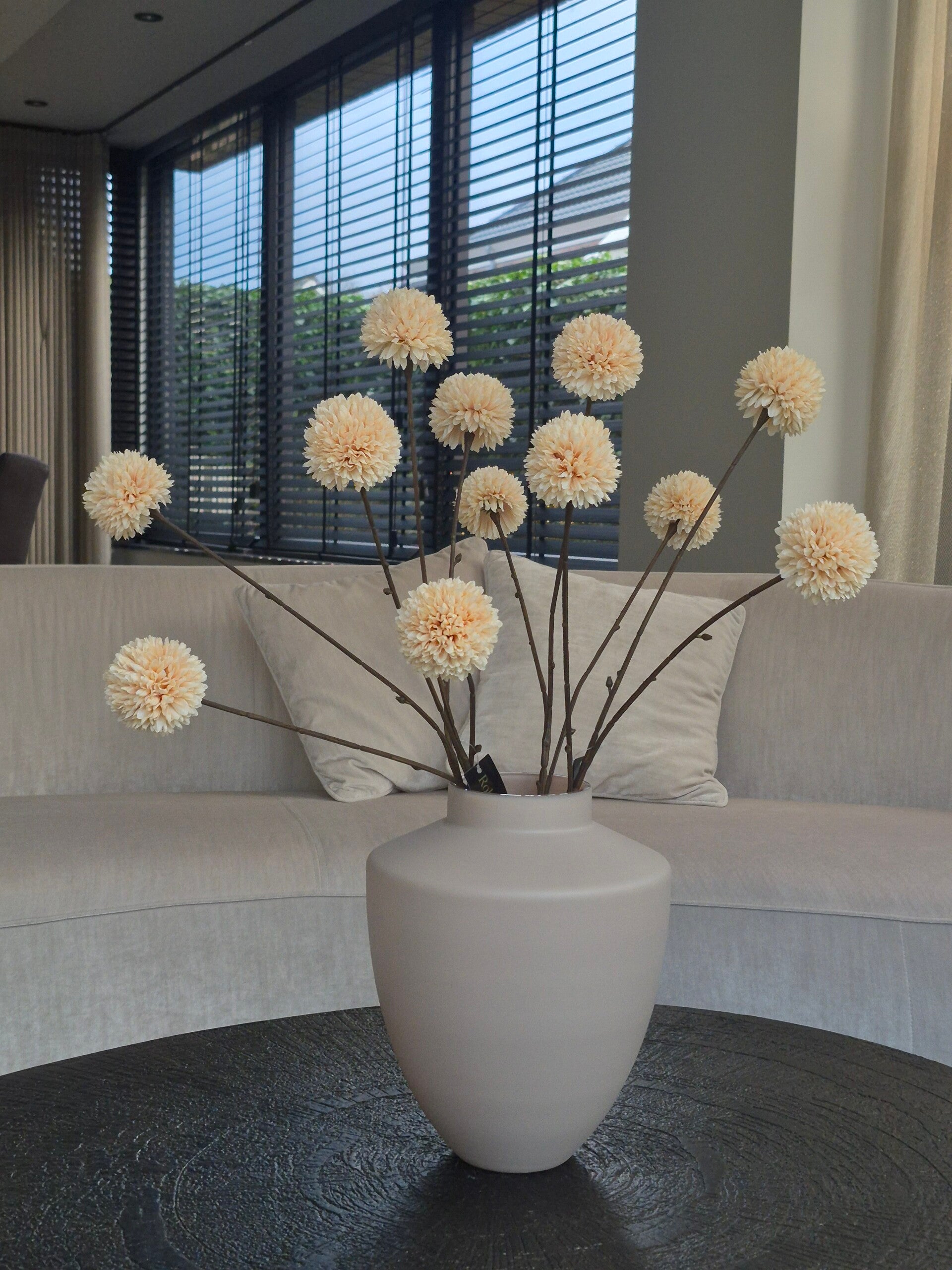 Pompon creme en bruin