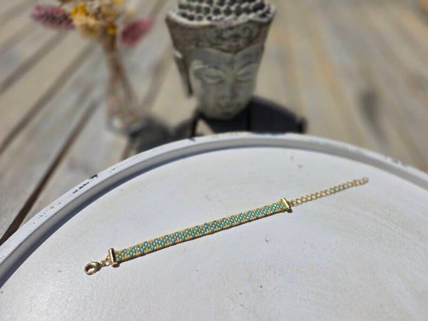geweven armband met miyukikralen (5 rijen) en gouden verlengketting