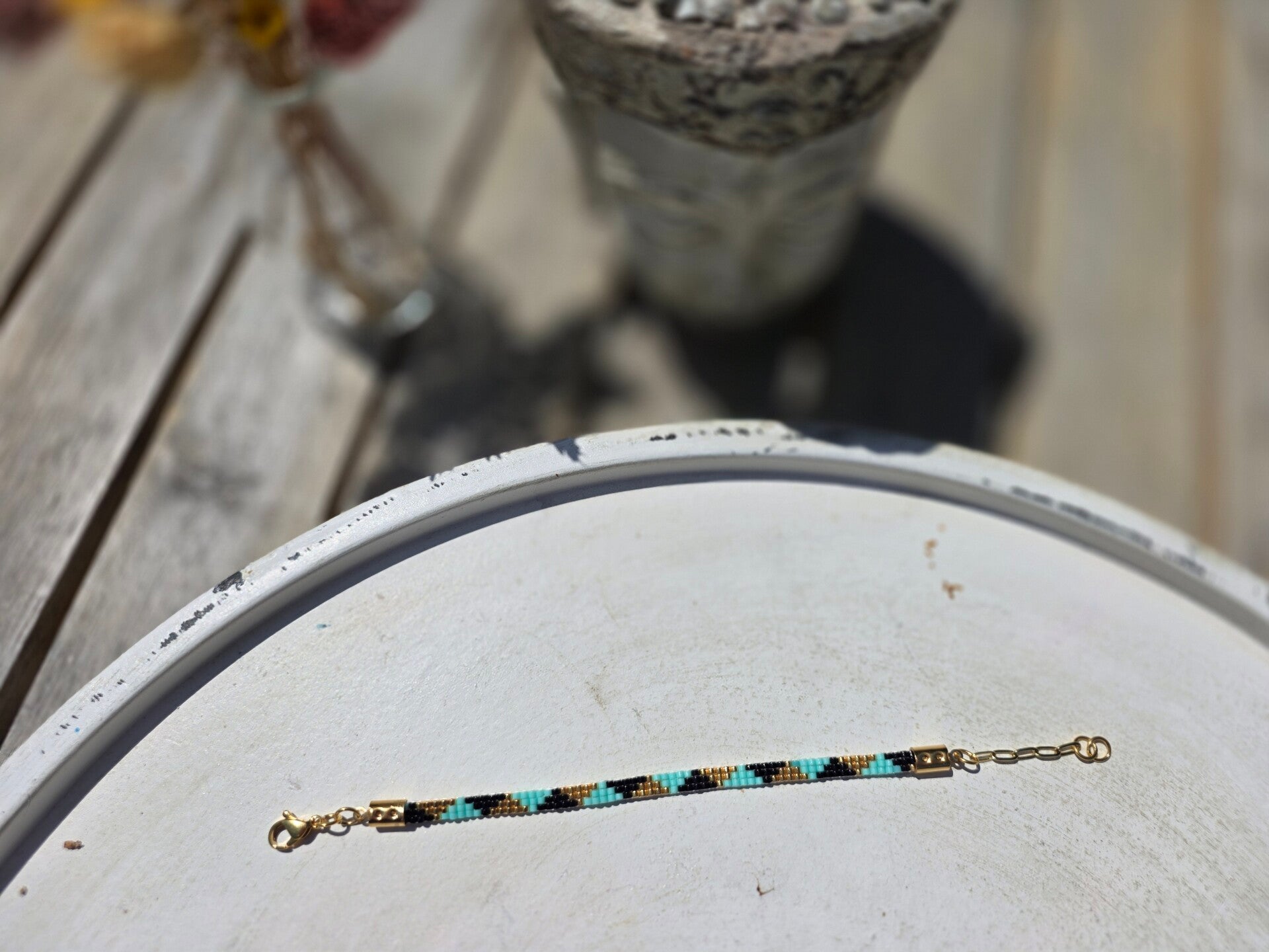 geweven armband met miyukikralen (3 rijen) en gouden verlengketting