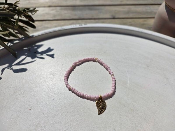 armband uit rocailles in zacht roze