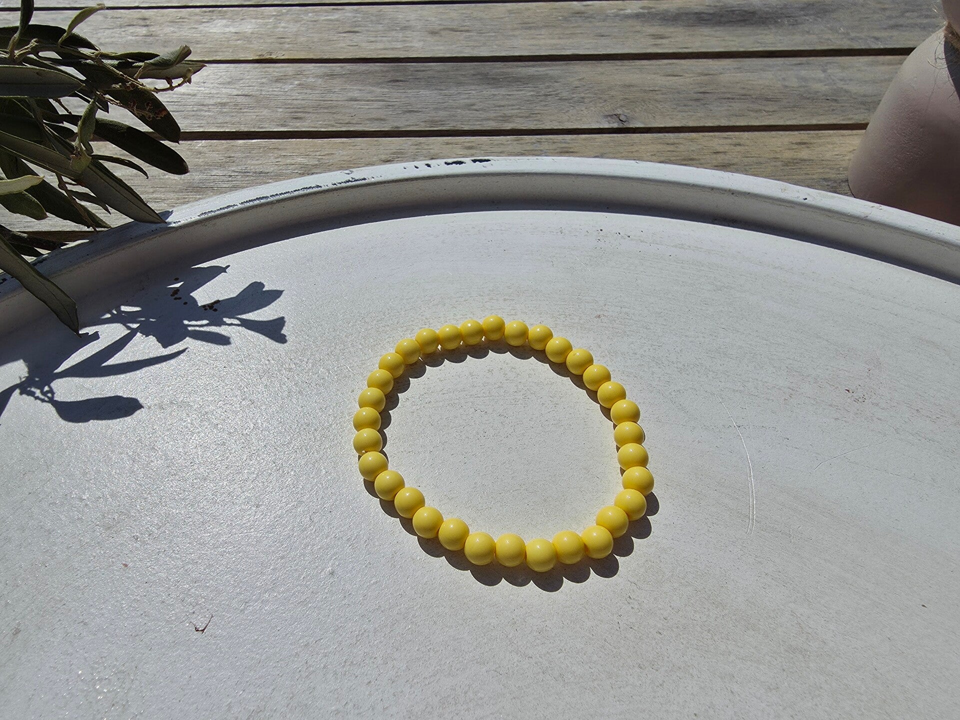 armband uit gele ronde kralen