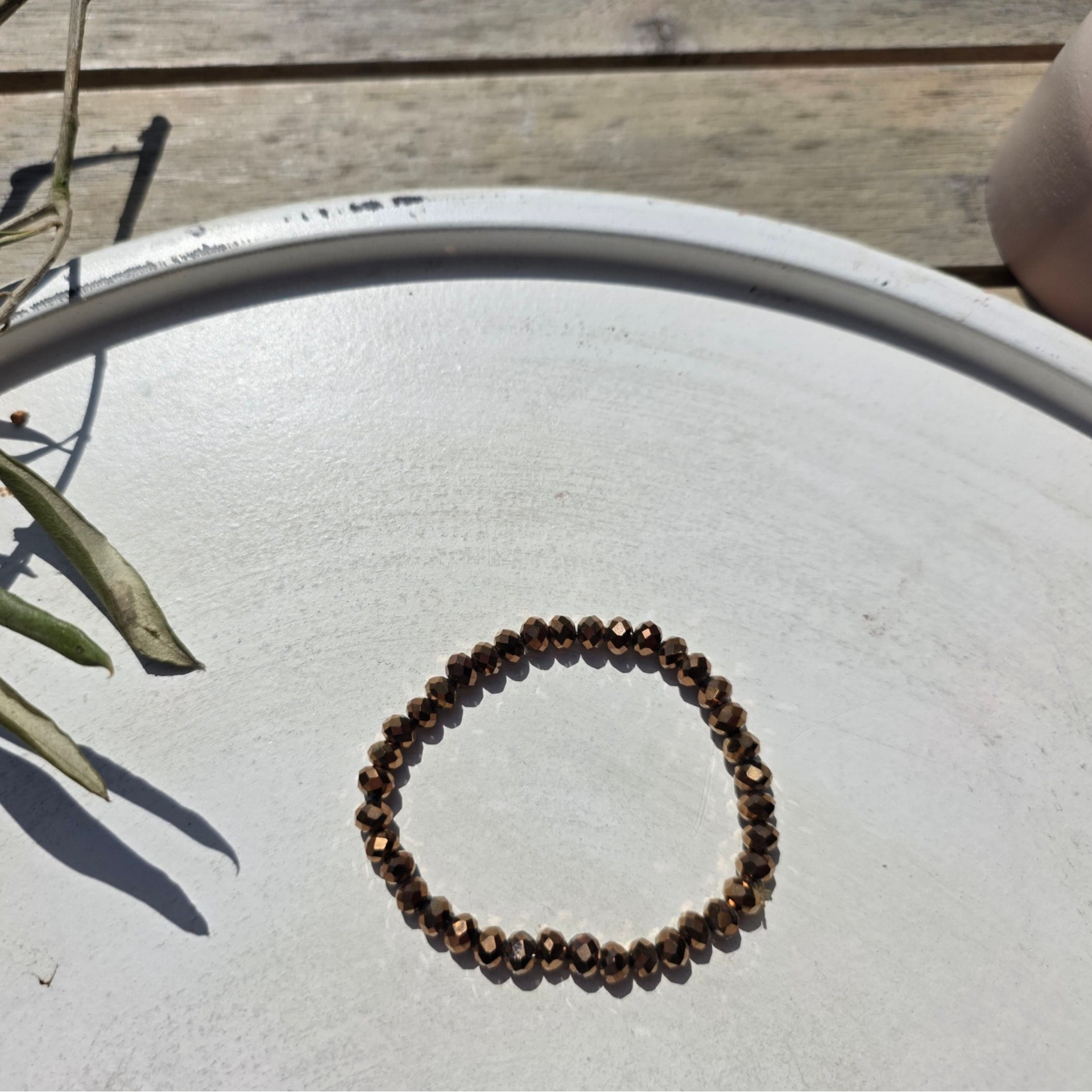 armband uit bronskleurige facetkralen (4mm)