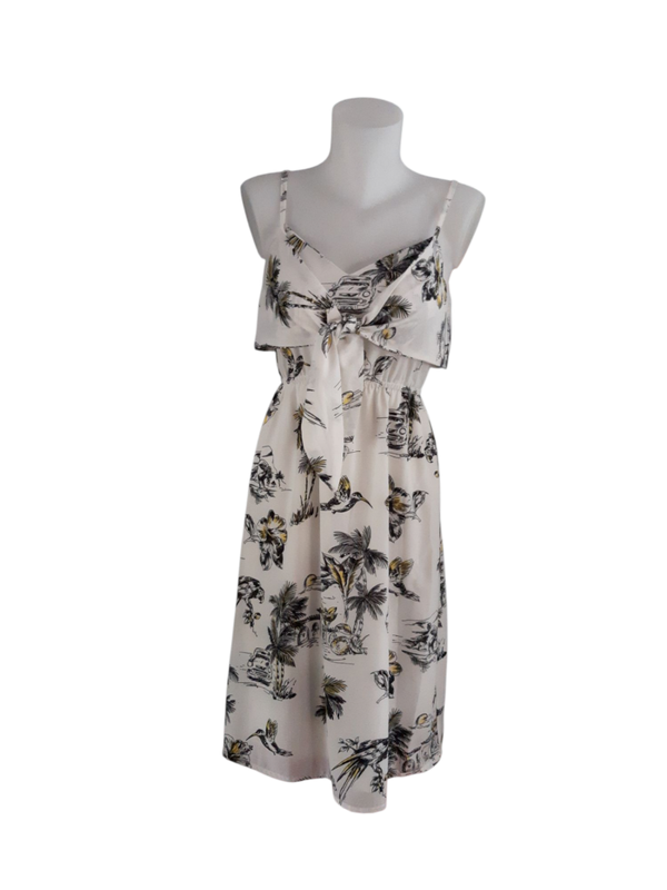 Robe légère à motif palmier et colibri – Élégance aérienne et exotisme