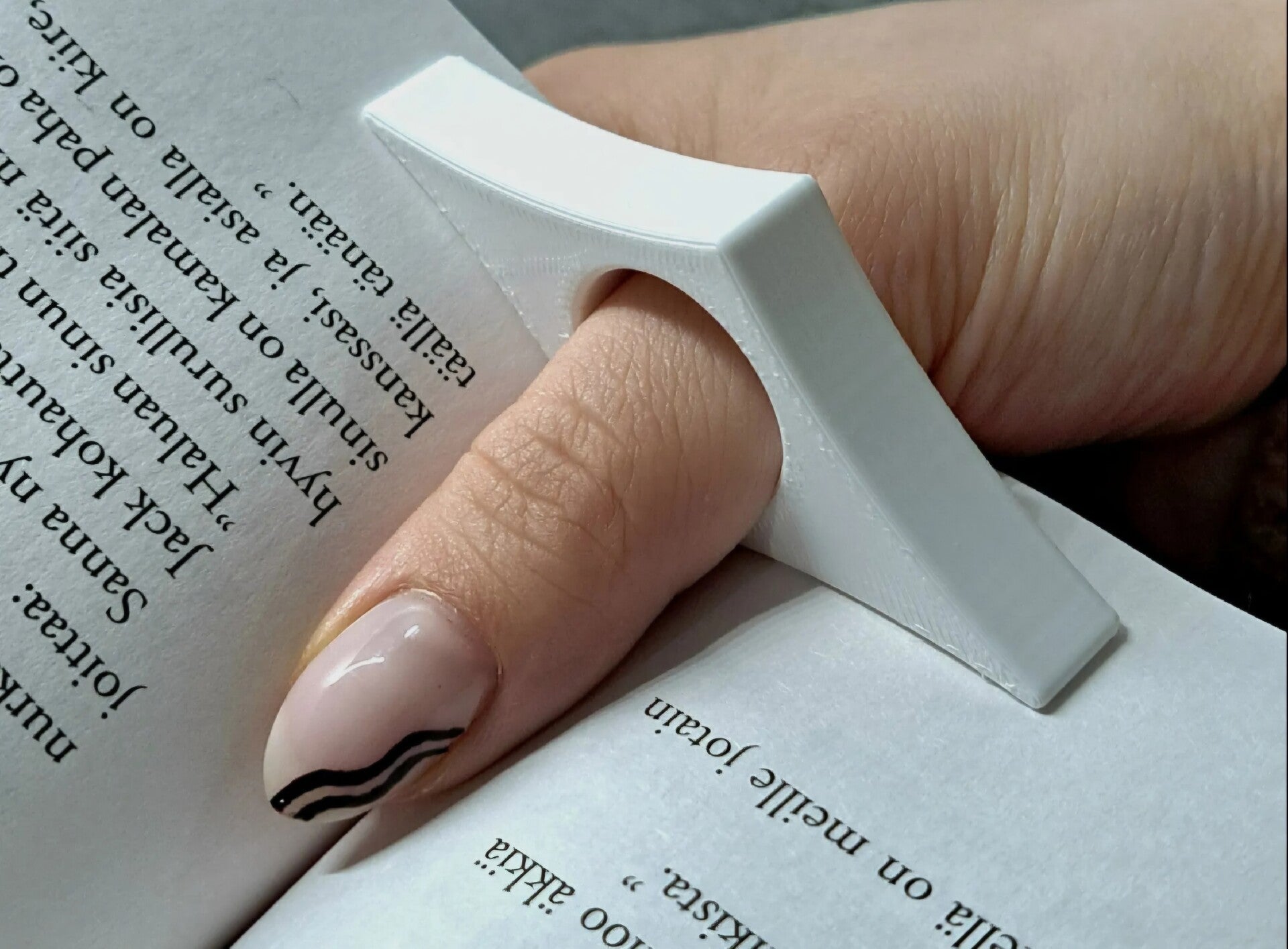 book page spreader/duim-boekhouder
