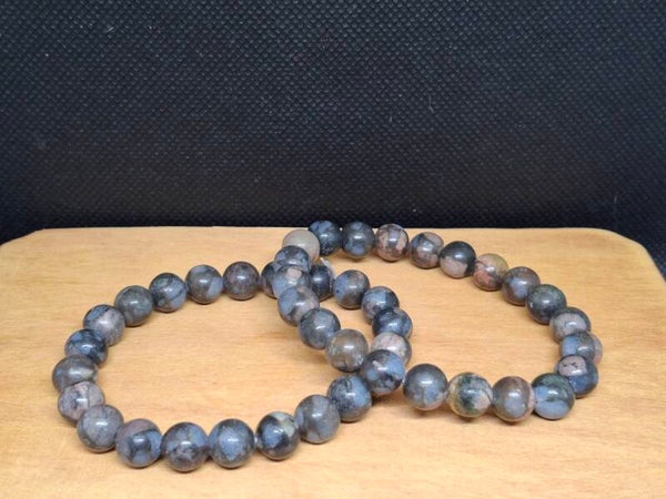 Llaniet of blauwe Que Sera armband 8mm