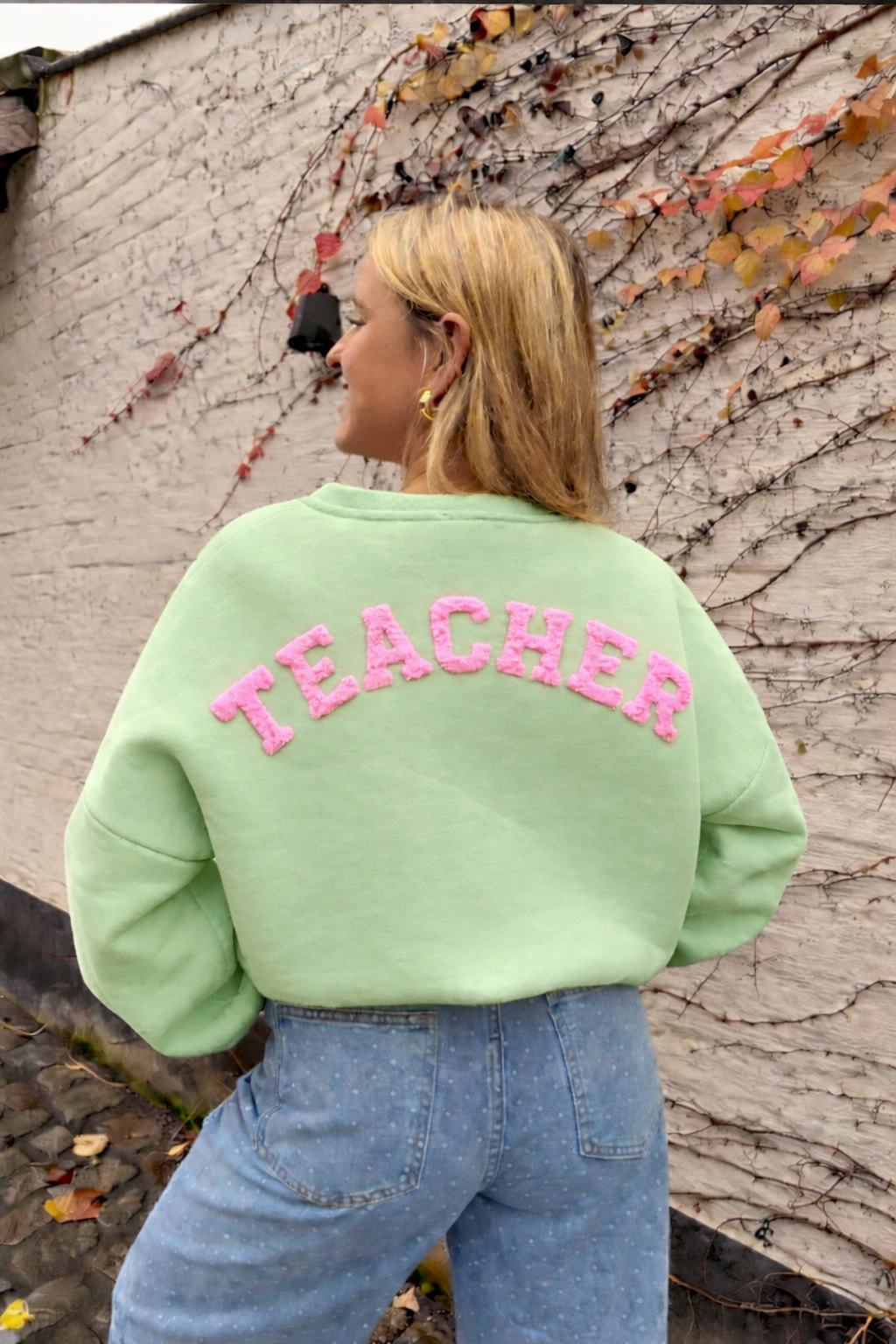 Teacher sweater groen roos