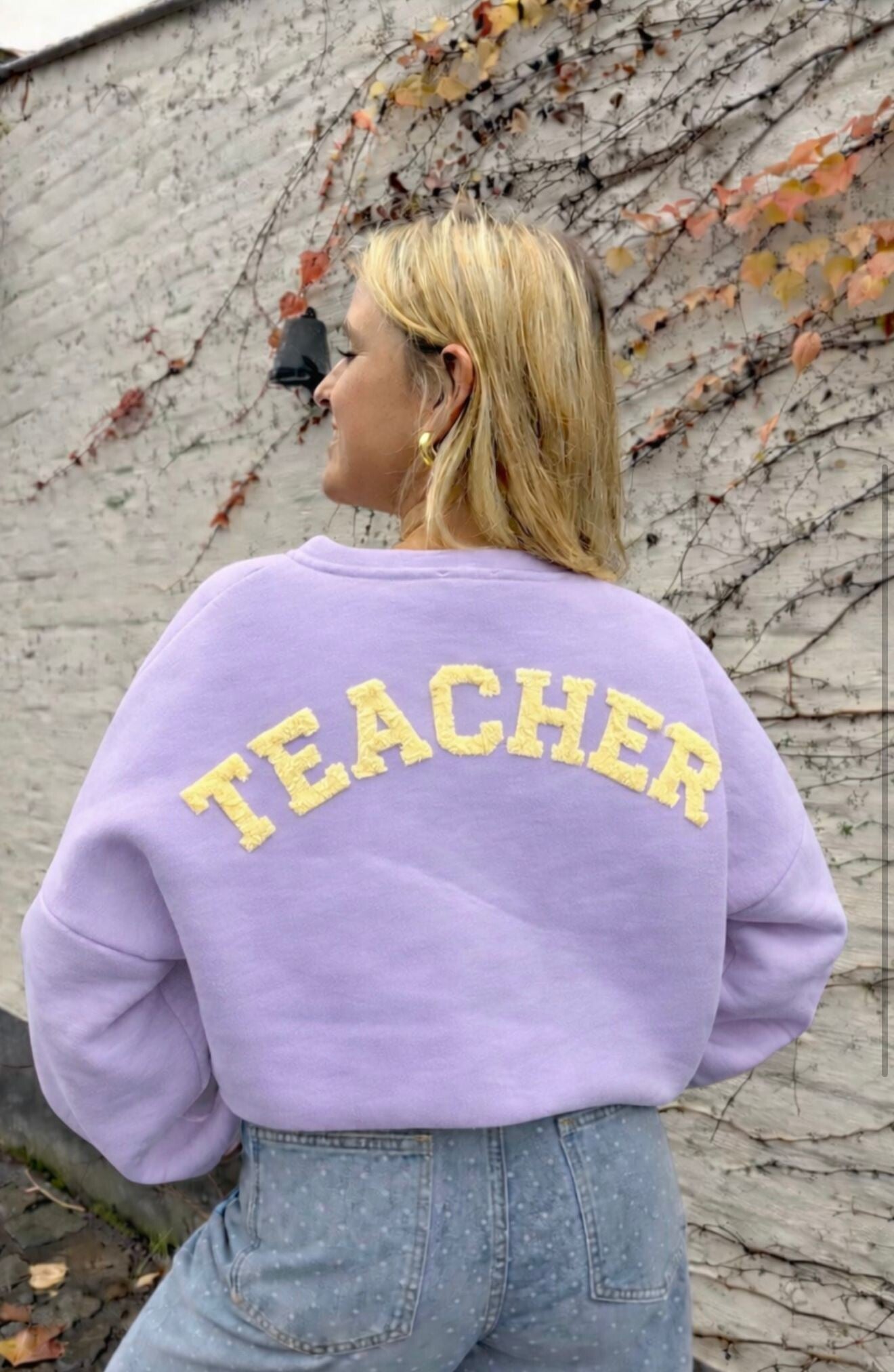 Teacher sweater lila lichtgeel