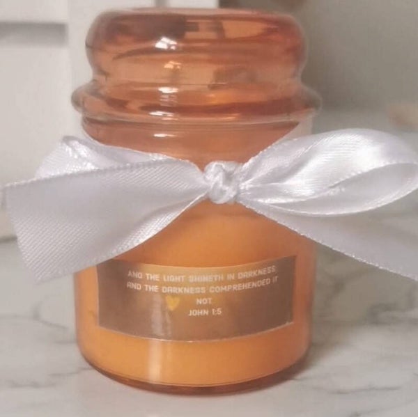 Scented scripture candle with a bow