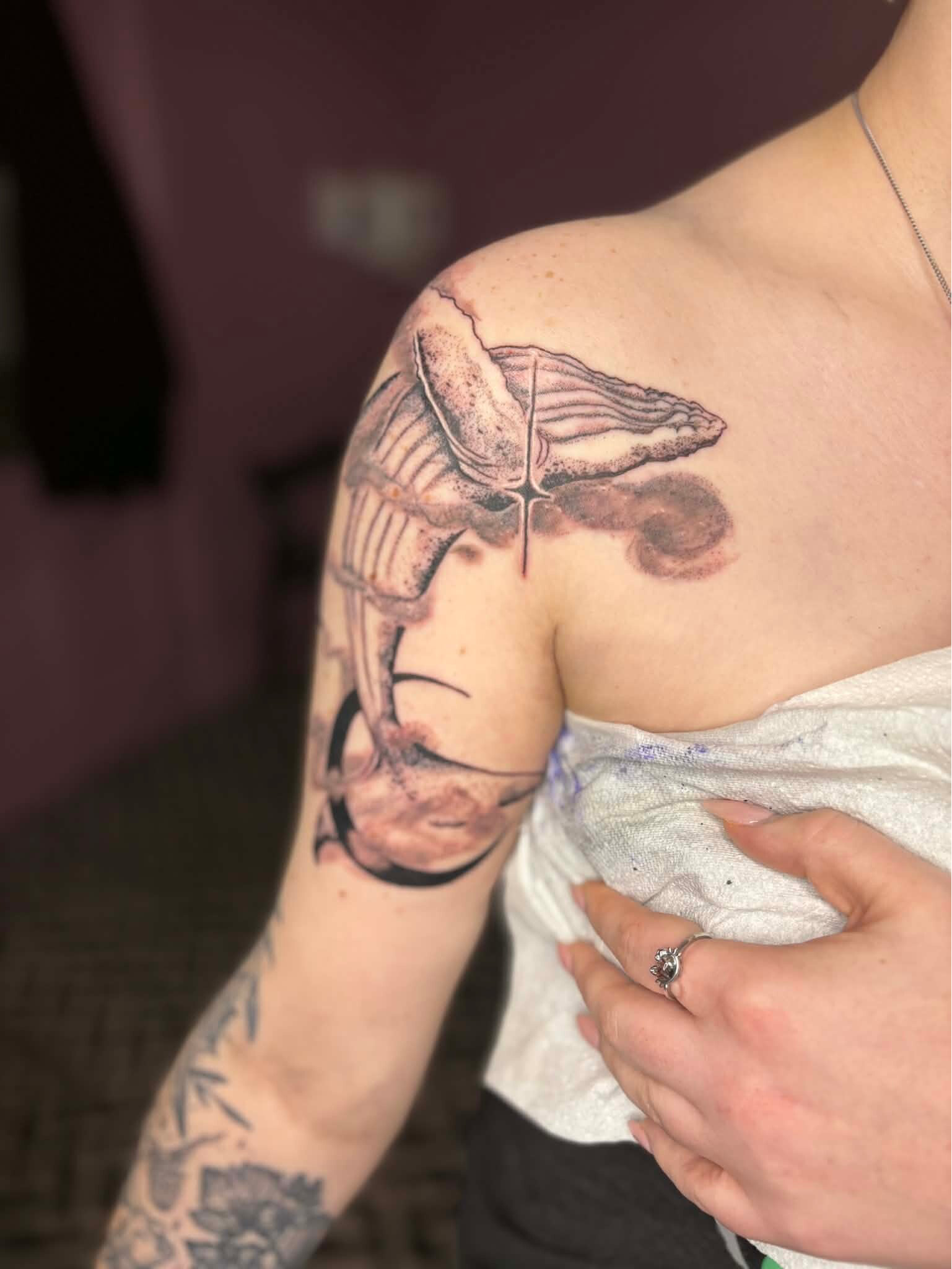 Dreamy magical moon whale tattoo done in llandudno studio