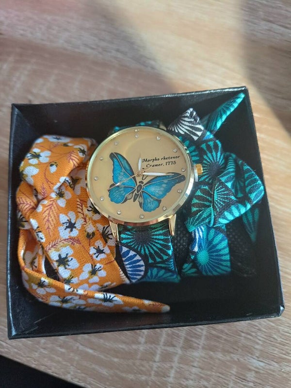 Montre papillon bleu
