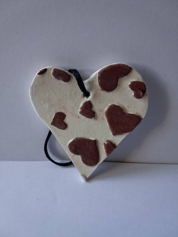 Coeur pendentif : Motif en relief Coeurs rouges