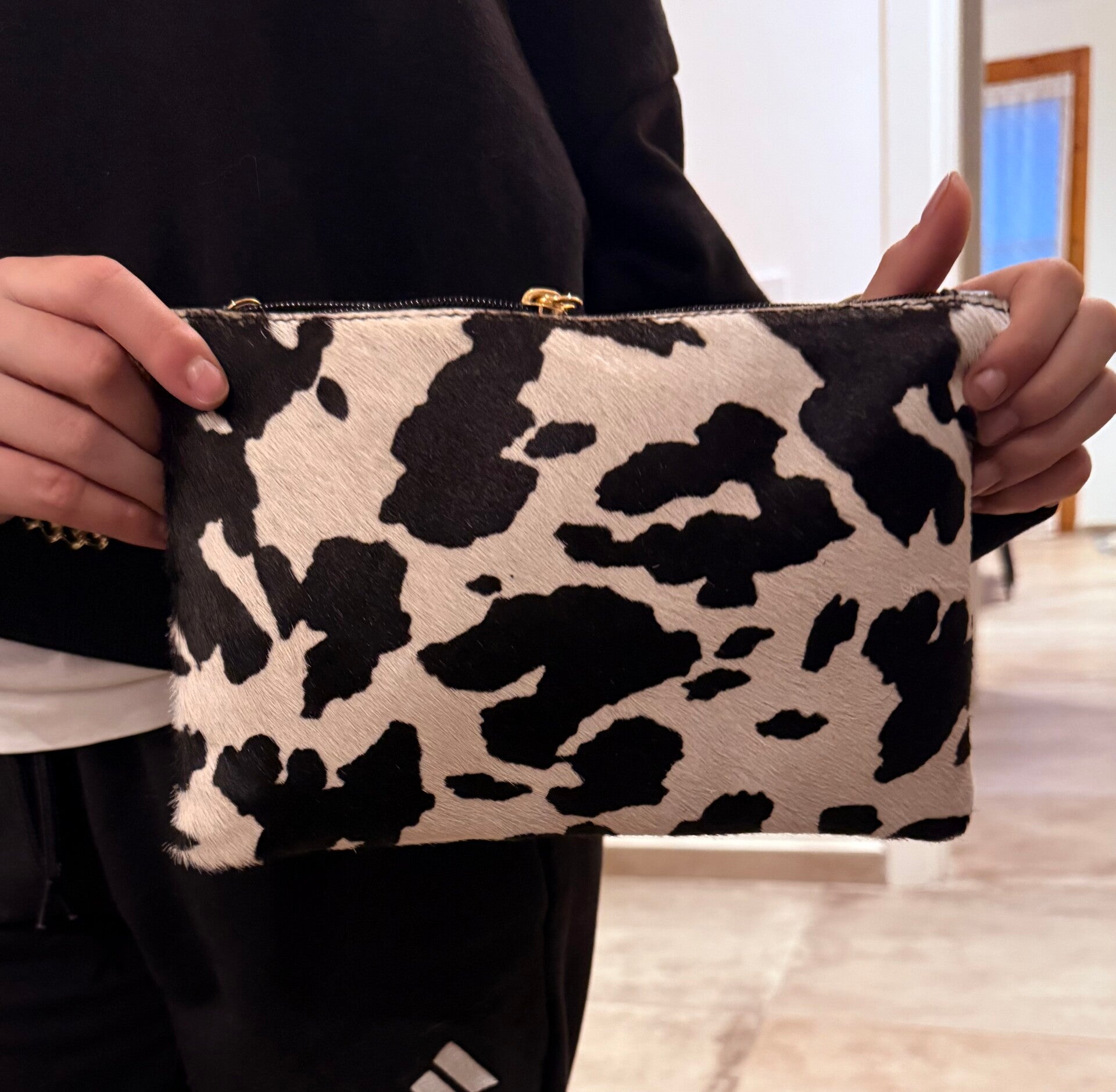 pochette maculata con catena dorata