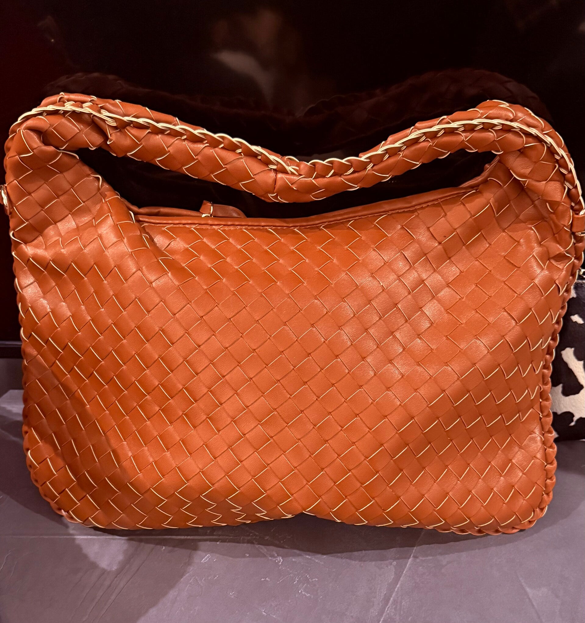 borsa marrone chiaro intrecciata