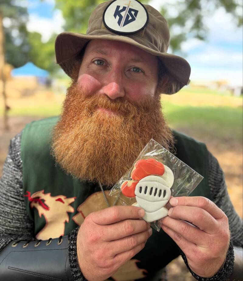 Joshua Knowles with a knight cookie