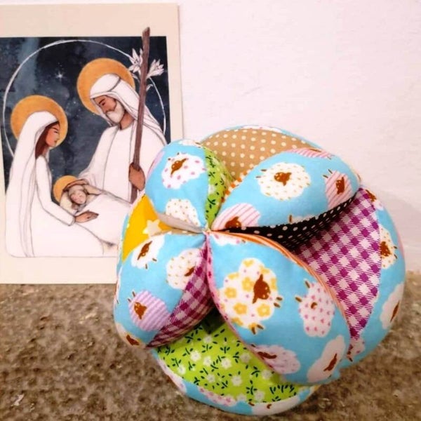 Pelota Montessori sonajero "ovejitas de Dios"