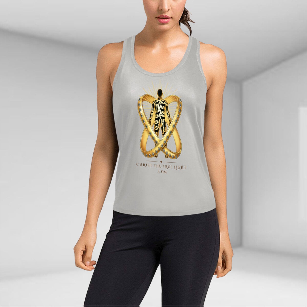 Grey racerback tank on a model, front three-quarter view. A figure stands inside two interlocking jewelled gold rings with light breaking from behind the head, CHRISTTHETRUELIGHT.COM set beneath it.