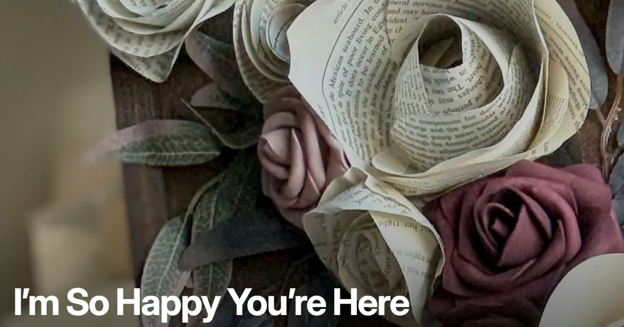 Image of flower bouquet made from recycled books. Image links to the Original Zen Collective website.