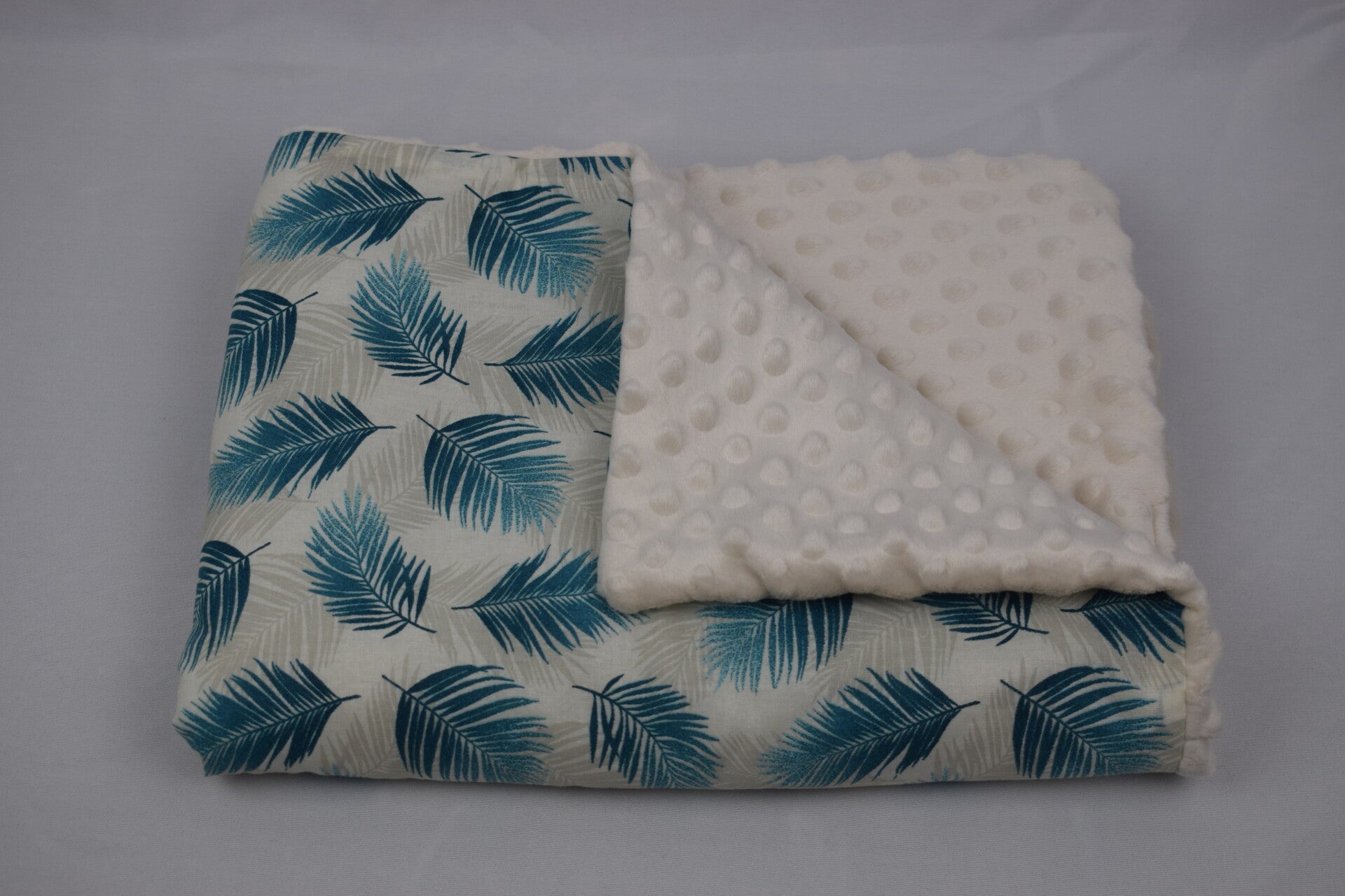 Couverture plumes bleues