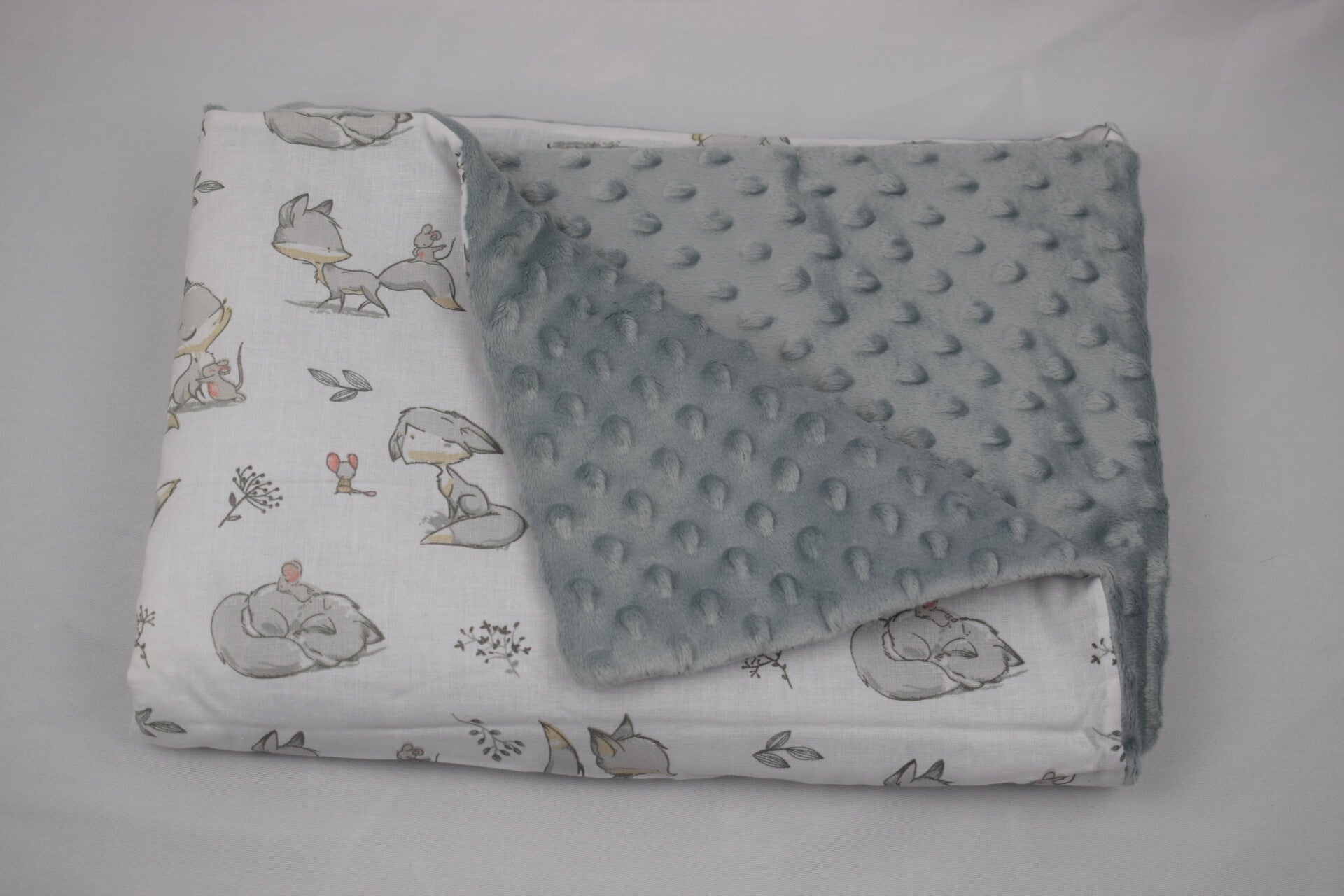 Couverture renards gris