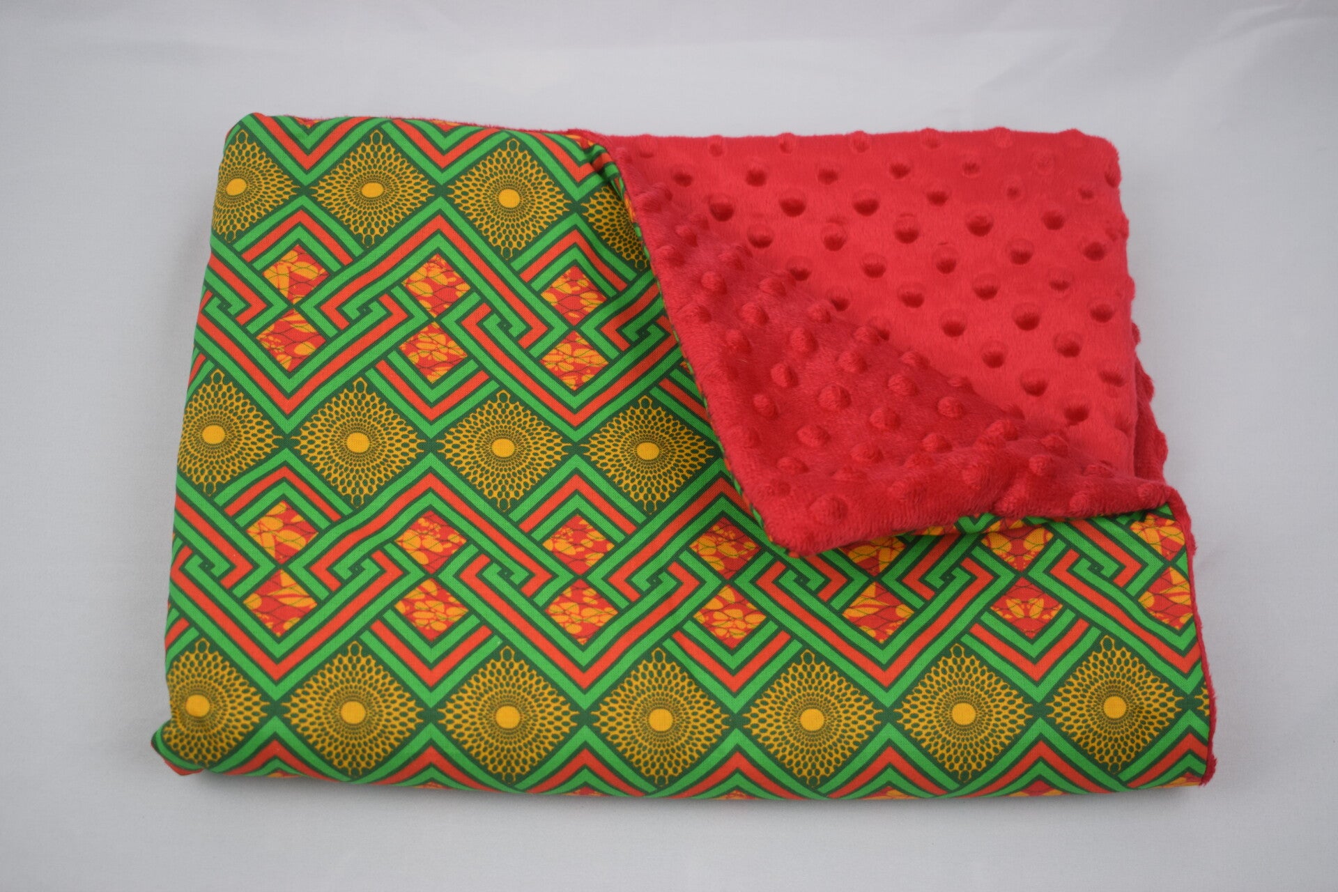Couverture vert et rouge