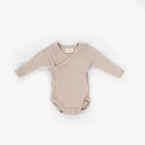 Kico label: Baby overslag romper merinowol beige