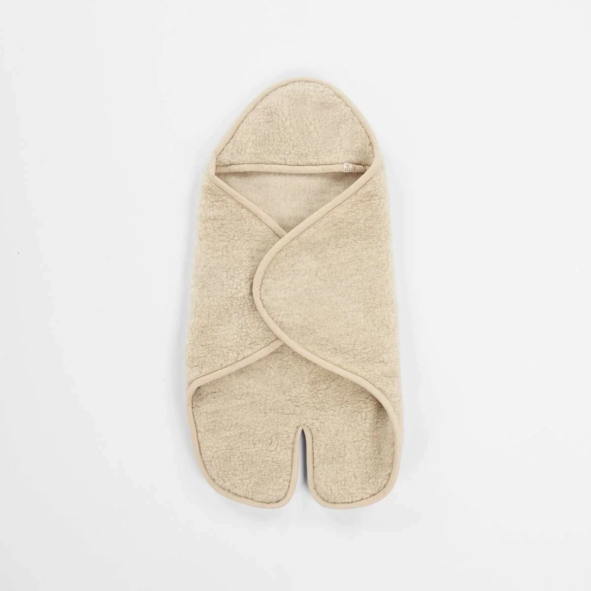 Kico label: Wikkeldeken met voetjes en capuchon Merinowol beige