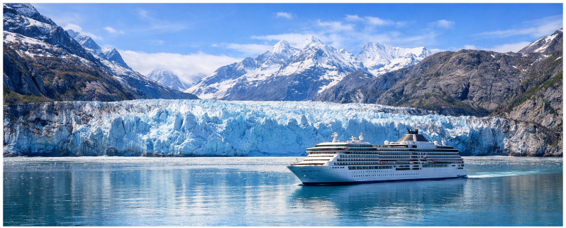 Cruise ship sailing near a glacier on an Alaska cruise
