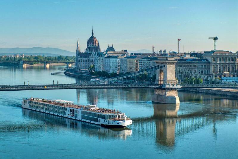 European river cruise ship sailing on the Danube River through Budapest, Hungary