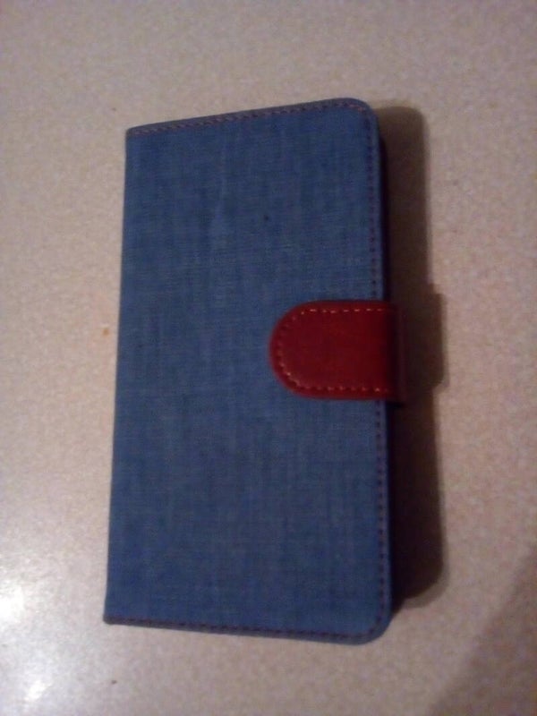 Telefoon-hoesje met magneet-sluiting spijkerstof-kleur