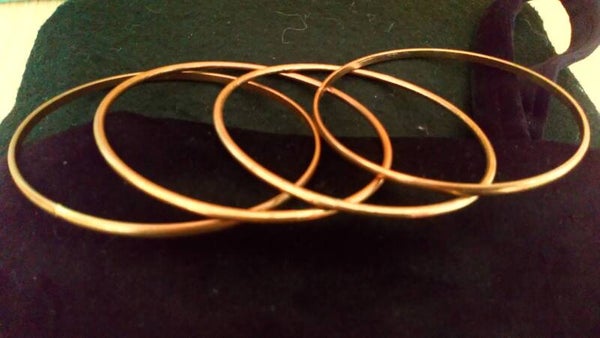 Armband 4 stuks koperkleurig