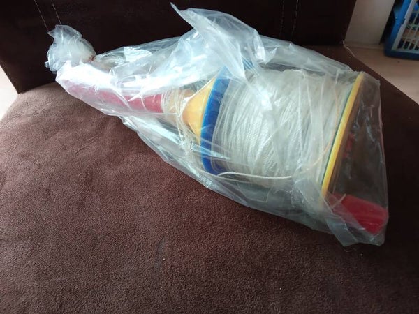 Vliegertouw op haspel