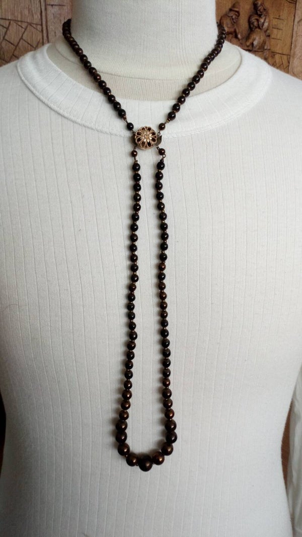 Ketting Western met donker bruine stenen en bloem