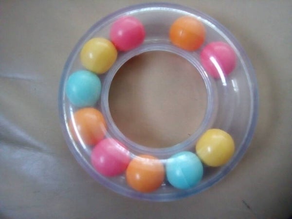 Bijtring met gekleurde ballen