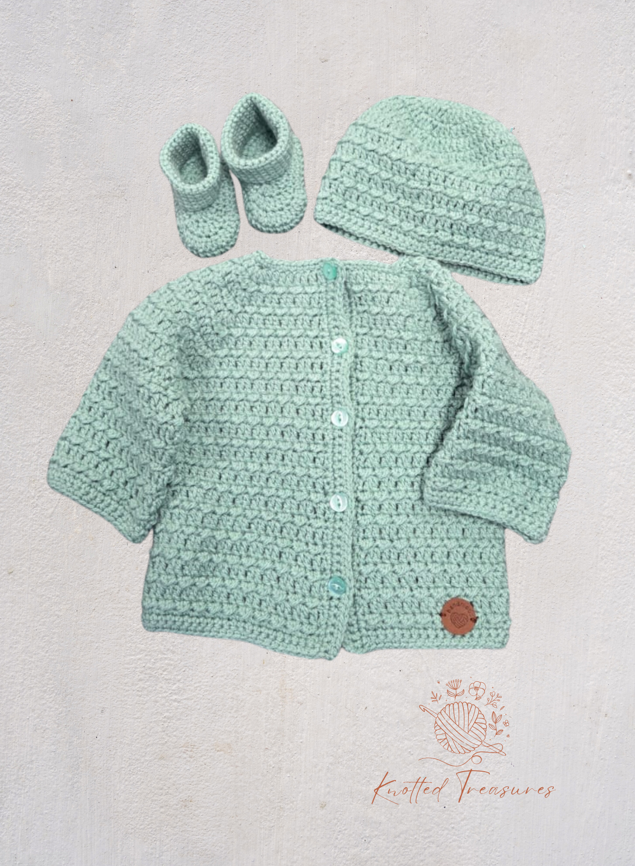 Baby cardigan with beanie and booties set