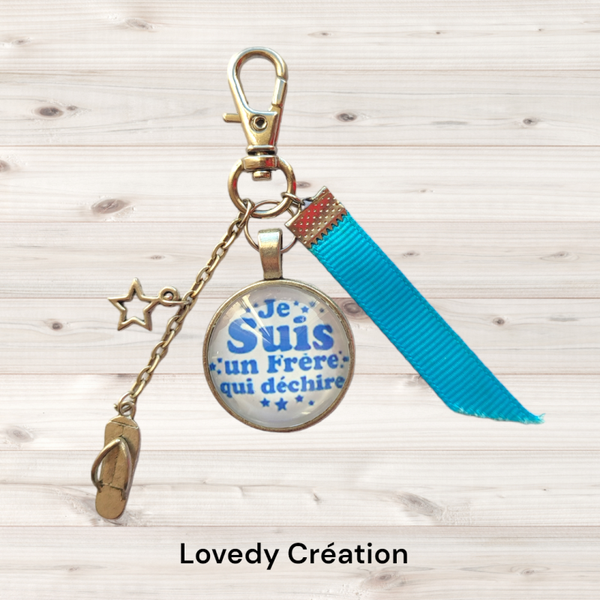 Porte clé  "je suis un frère qui déchire"