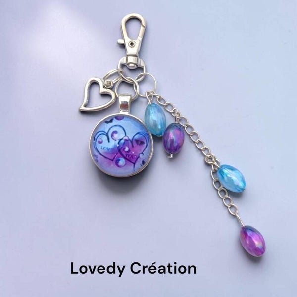 Porte clé / Bijou de sac Collection Love Dy - Bleu et parme