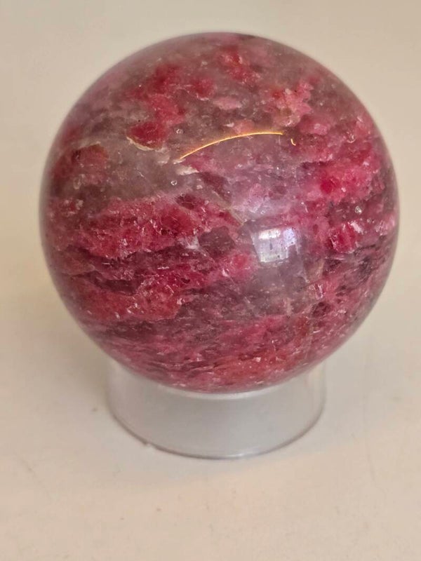 Icy Rhodonite Sphere Z907