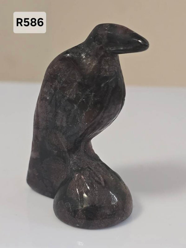 Raven Carvings In A Variety of Materials