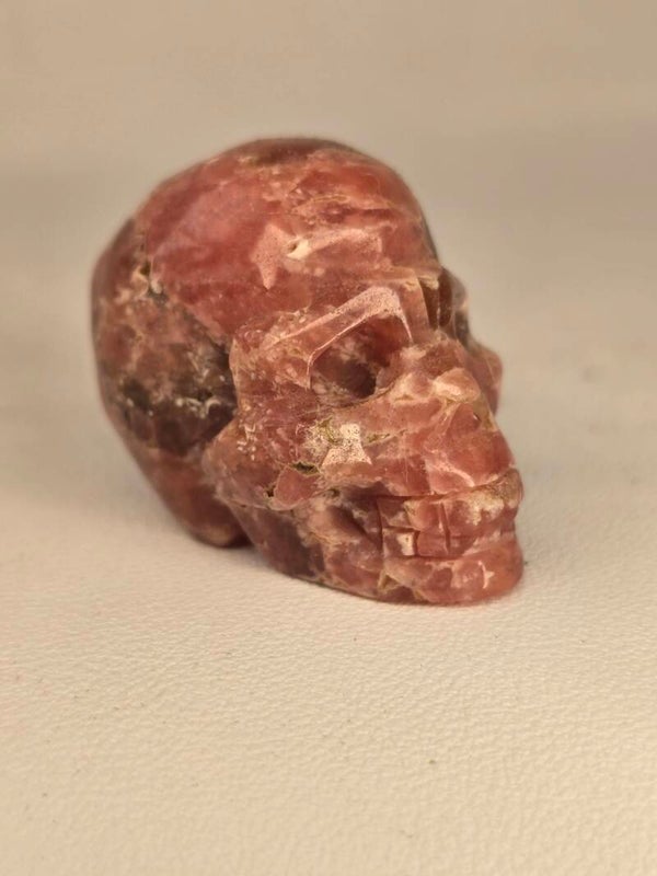 Rhodocrosite Skull Carving D169