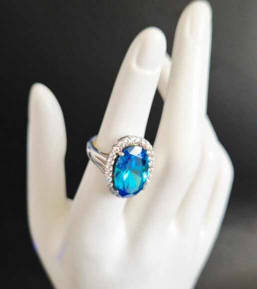 Oval Blue Topaz and Sterling Silver Ring
