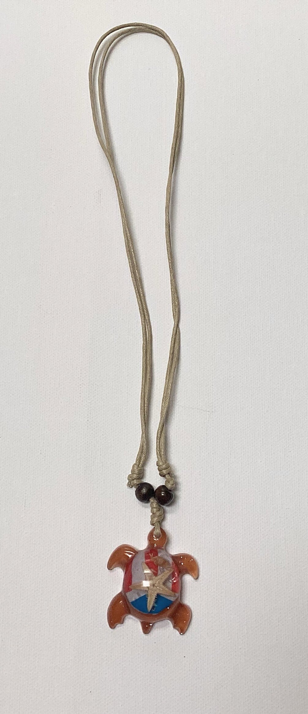 Turtle necklace with the Puerto Rico flag cream color