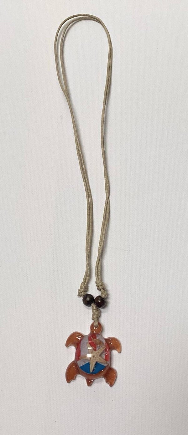 Turtle necklace with the Puerto Rico flag cream color