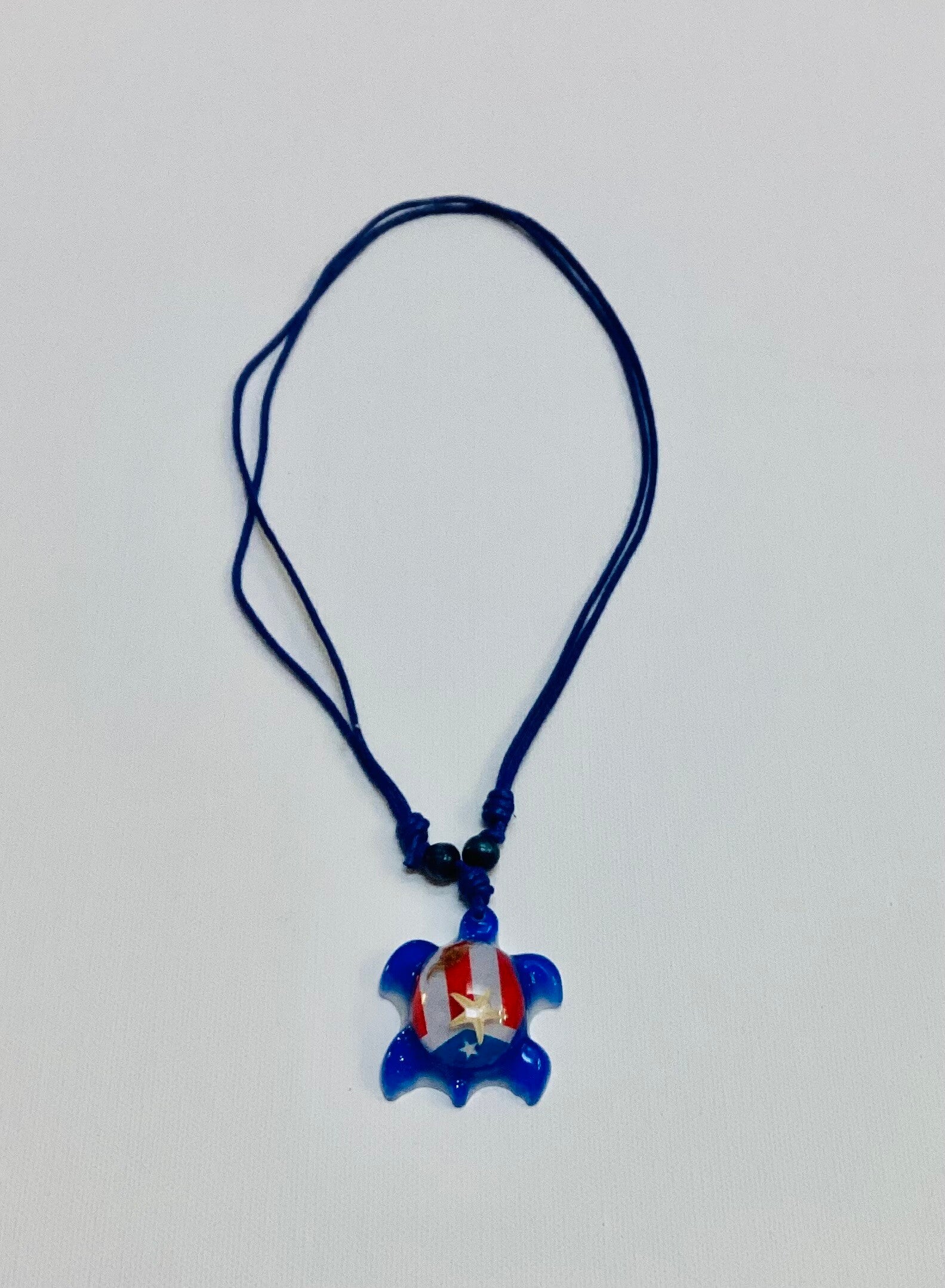 Turtle necklace with the Puerto Rico flag  blue