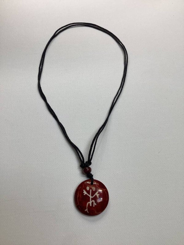 Brown circular coqui necklace