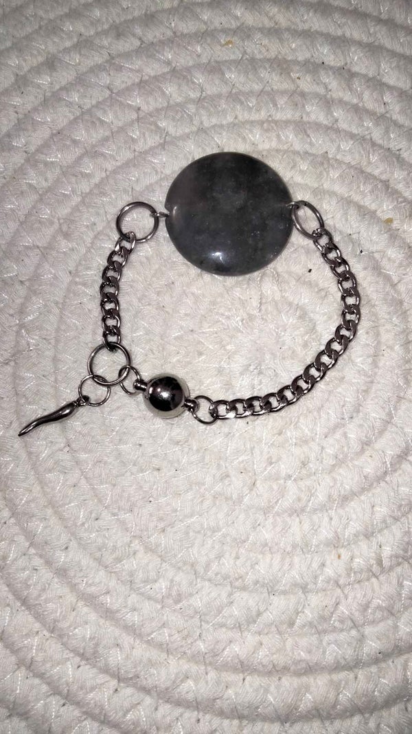 Quarzo grigio medaglione forato bracciale acciaio