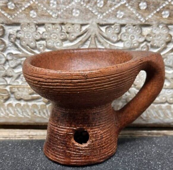 Bruciatore in terracotta con manico