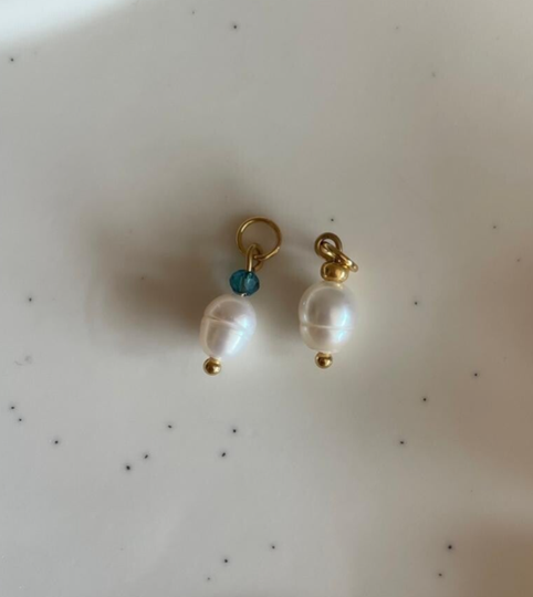 Parel met Kraal bedel - goud