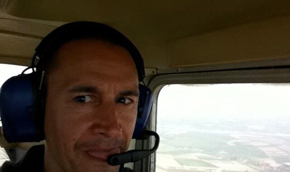 Marcel Romdane on solo flight, attempting a professional pilot expression. From Riches to Rags: An African Odyssey, Part VIII — Taildraggers, Tantrums, and the Final Nail in Sanity’s Coffin. Confidence: simulated. Sanity: missing in action.