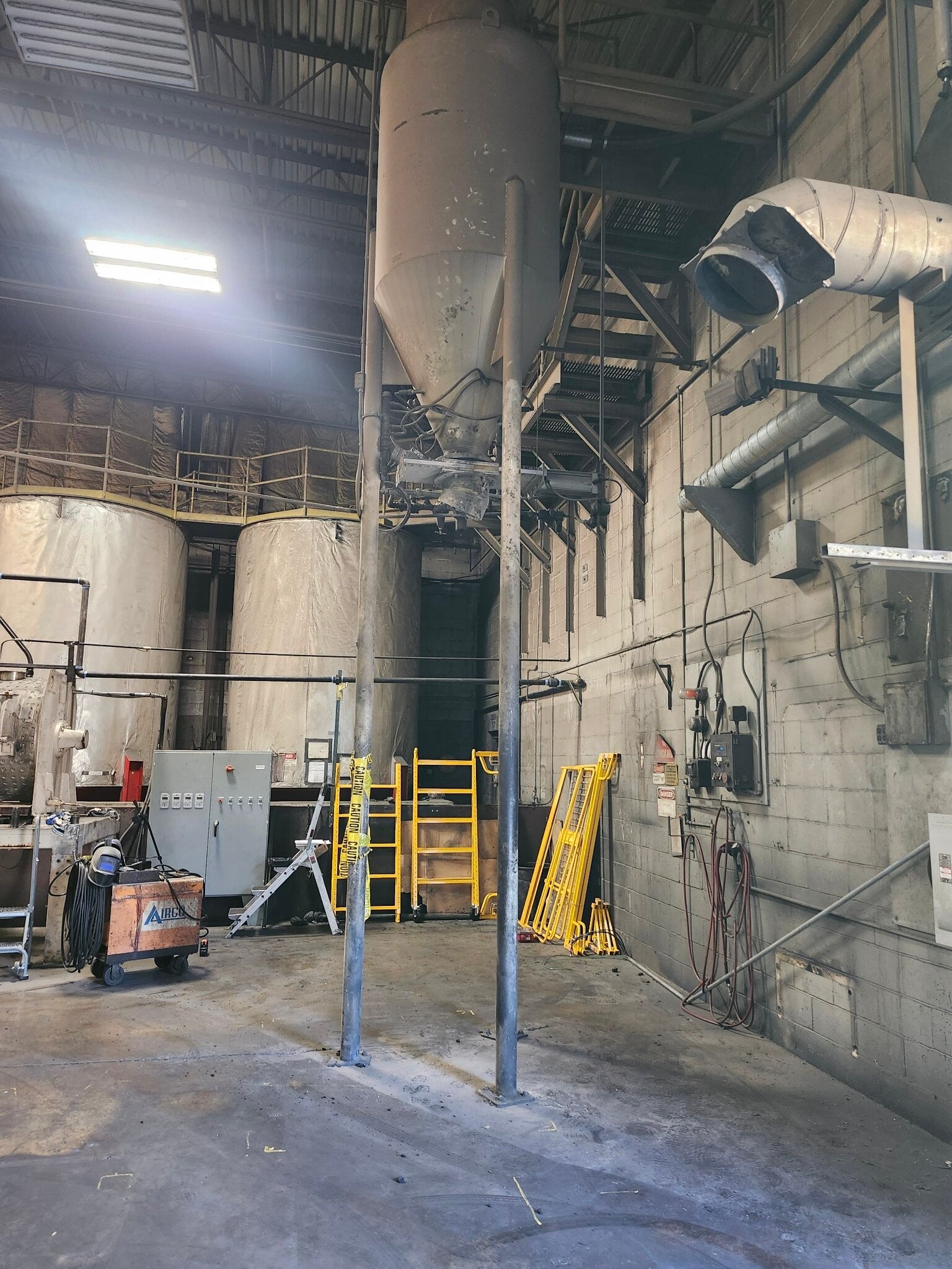 Industrial welding and fabrication inside a Pittsburgh plant by BCD Steel Solutions