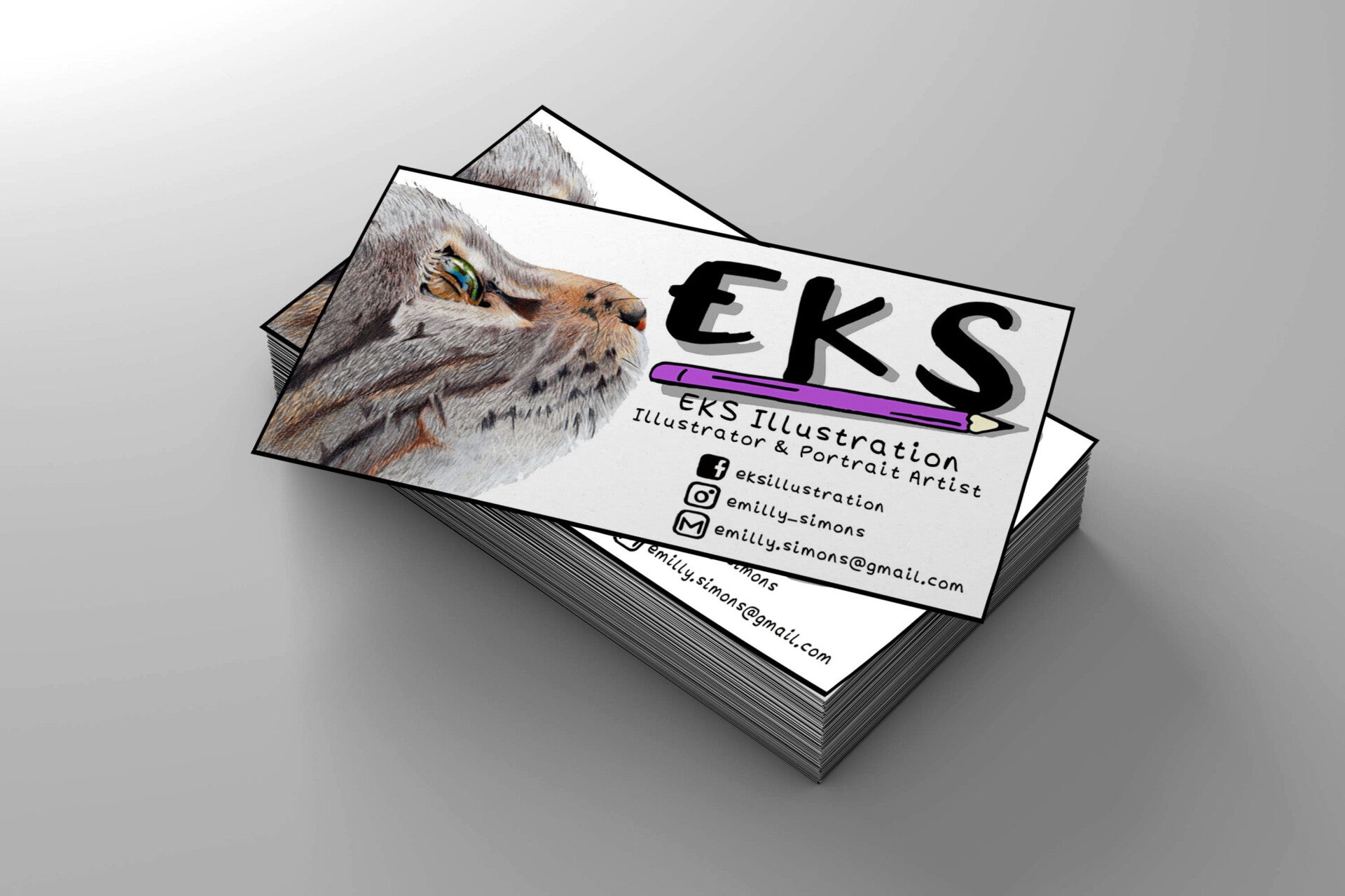 A stack of business cards with EKS Illustration logo and design on them
